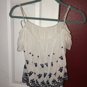 White and blue off the shoulder shirt